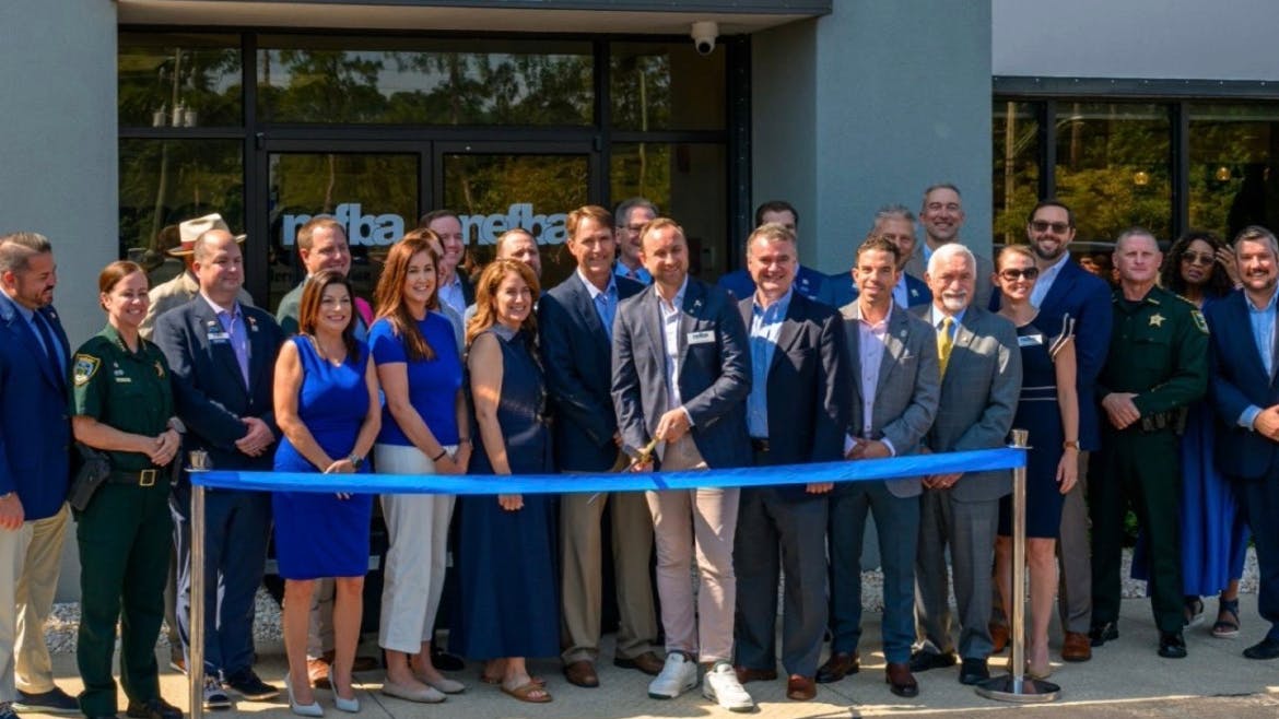 At the ribbon cutting ceremony, with members of the NFBA and state and local leaders.
