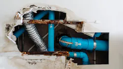 water leak from waste piping system