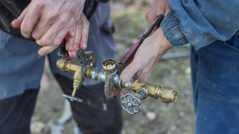 subcontractors working a plumbing job