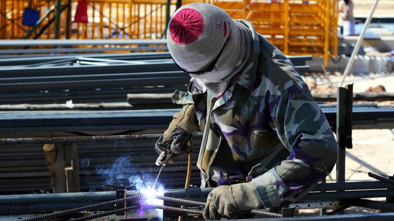 welder working on a construction site