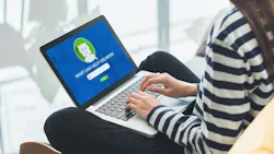 woman opening ai on her laptop