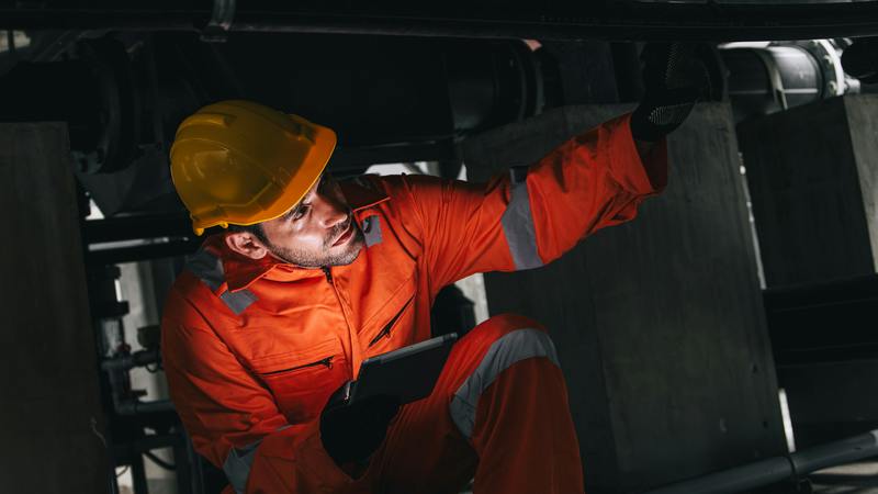 maintenance worker with tablet computer