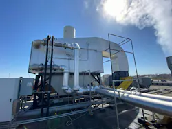 A condensing waste-heat recovery system designed to reclaim energy from boiler exhaust gases was installed to overcome steam capacity limitations without adding a fourth boiler. The recovered energy now preheats process water.