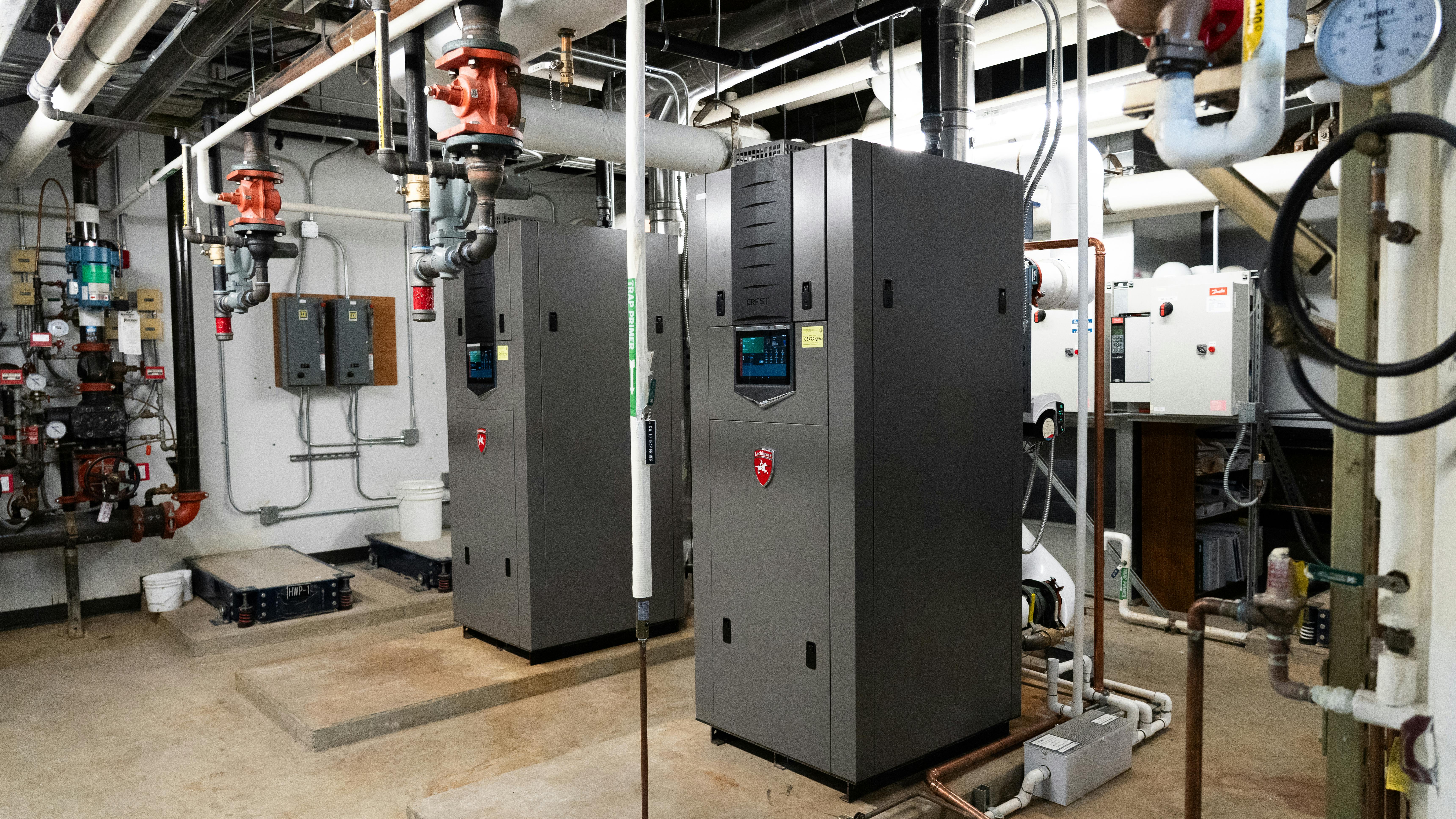 A modern boiler room with thew Lochinvar CREST boilers offering Hellcat combustion technology.
