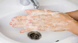 close up of hands washing