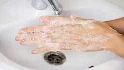 close up of hands washing