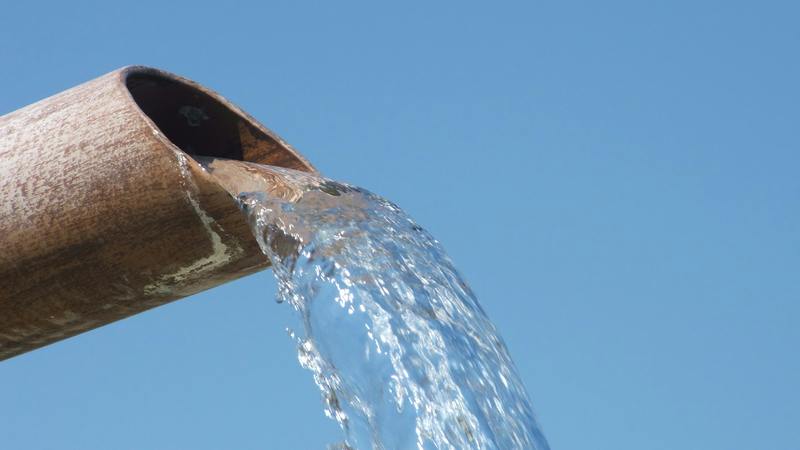 drainage pipe against a blue background