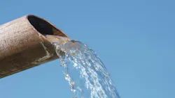drainage pipe against a blue background