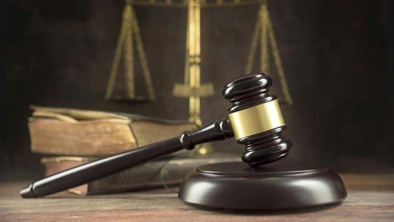 gavel, scales of justice and law books