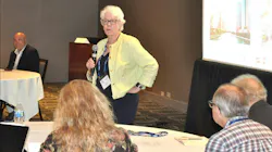 Sheridan attending an industry summit.