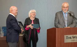 Enjoying the moment during an awards presentation.