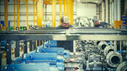 The facility features multiple newly constructed buildings outfitted with overhead cranes and streamlined assembly workflows.
